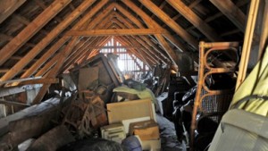 attic-filled-with-stuff make more space with a loft conversion